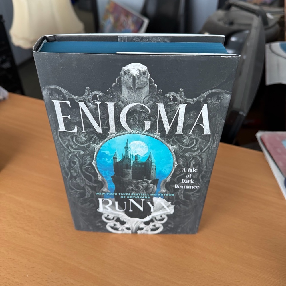 Enigma by Runyx Hardcover Book with Sprayed Edges
